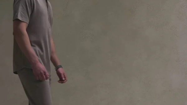 Anti Label menswear campaign with a model in a muted grey outfit